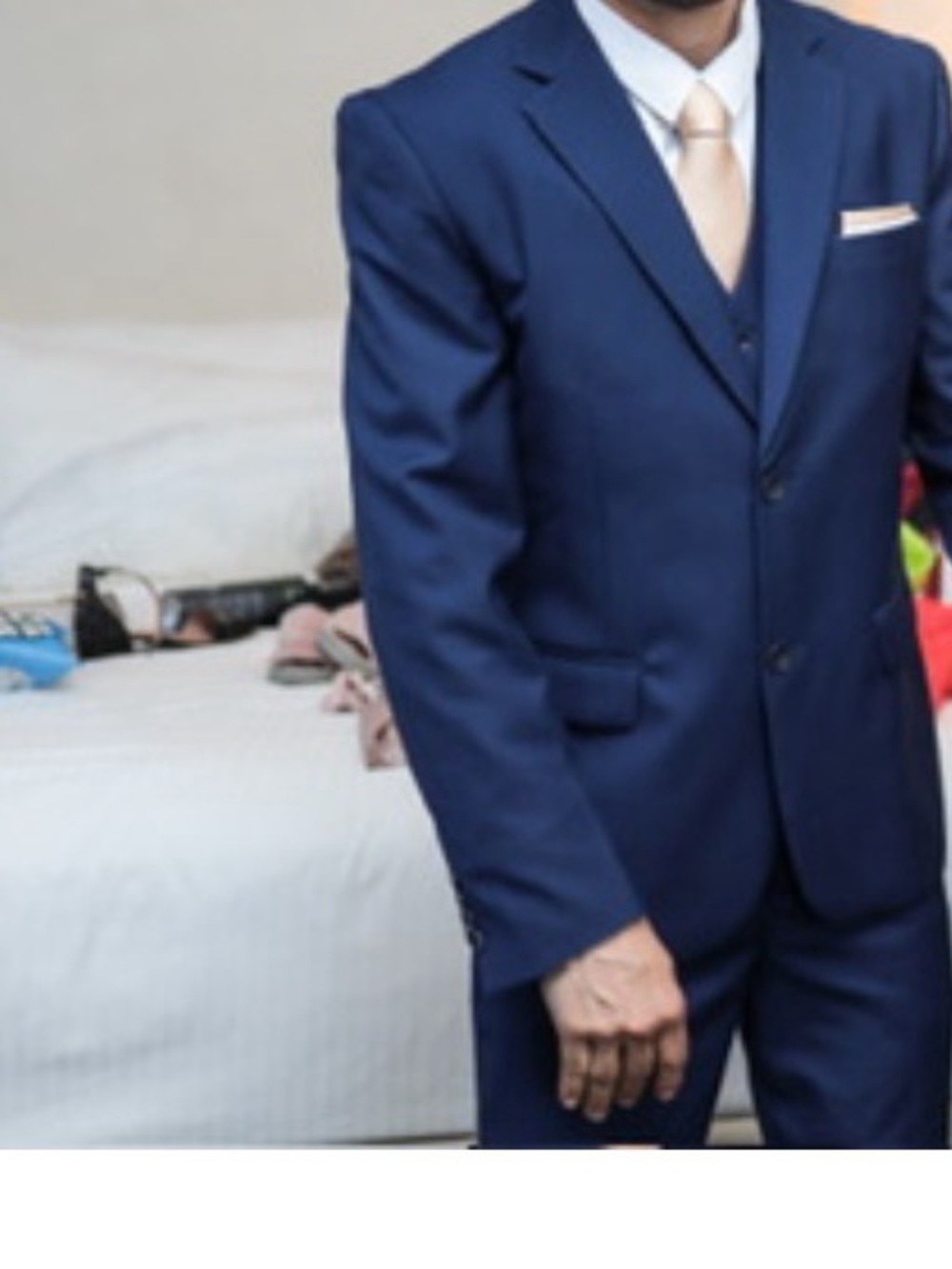 Men's Navy Blue Three-Piece Suit with Cream Tie